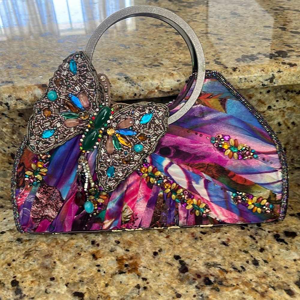 Used sides are a bit rusty but front and beading good